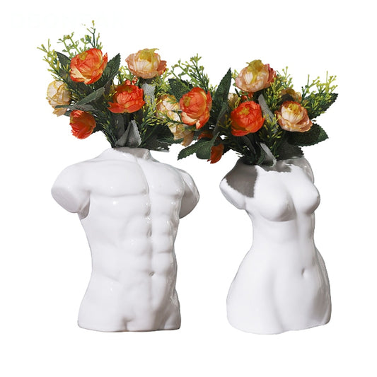 NUDE FLOWER HEADED ART